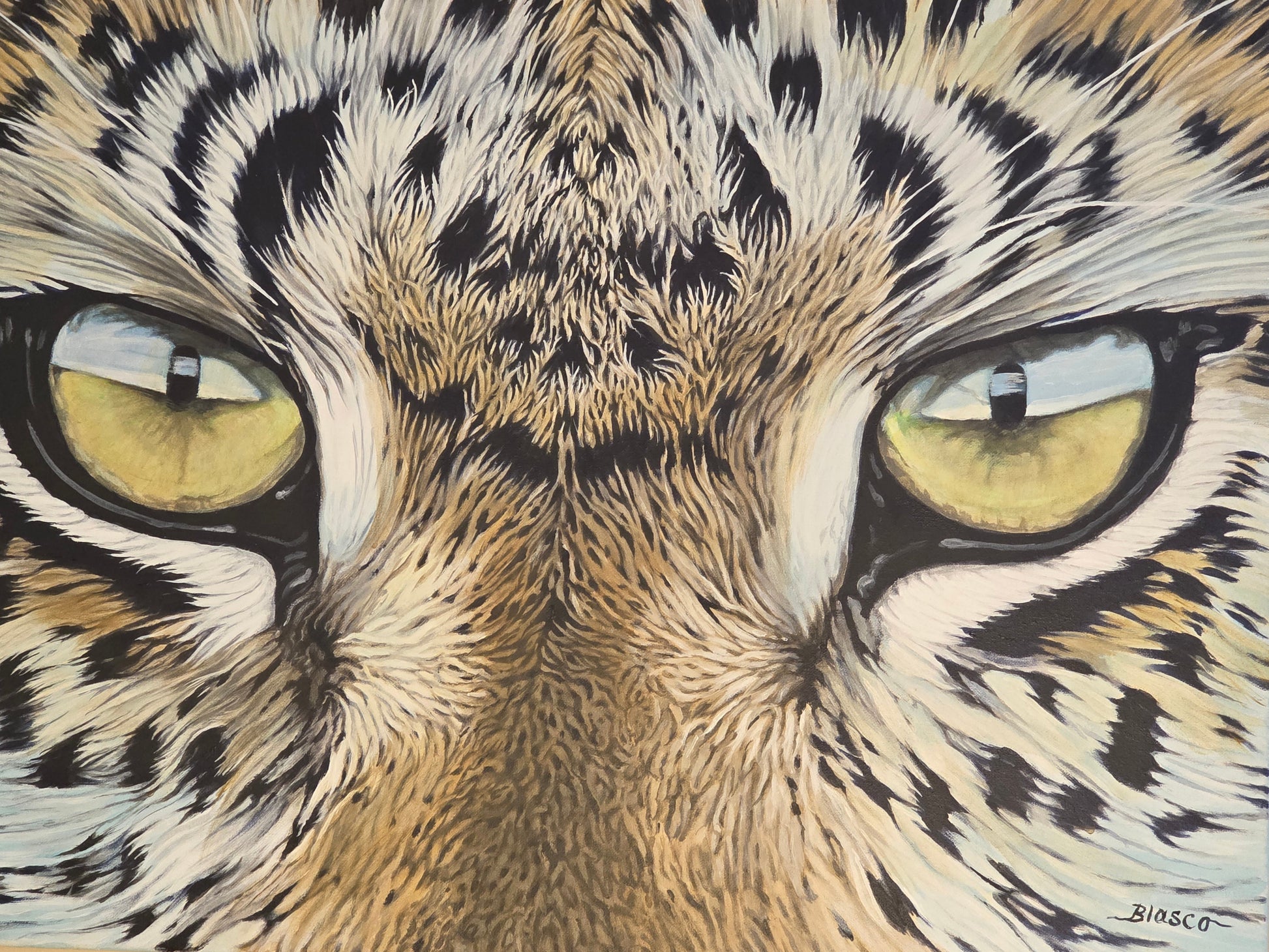 Close-up of a leopard's face with detailed fur and yellow eyes.